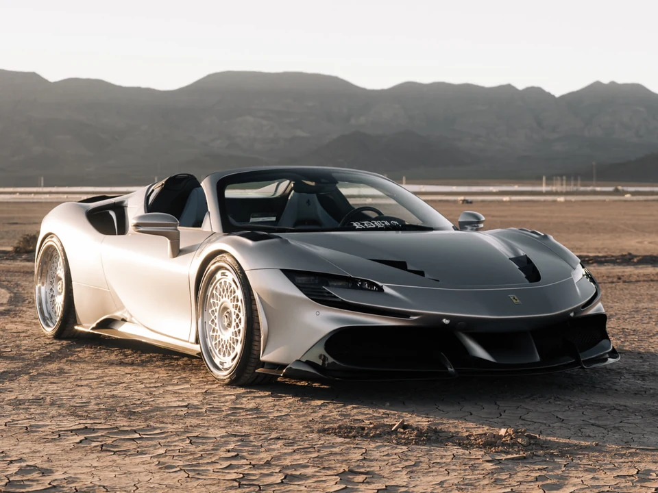Silver performance convertible with a satin finish in a desert setting