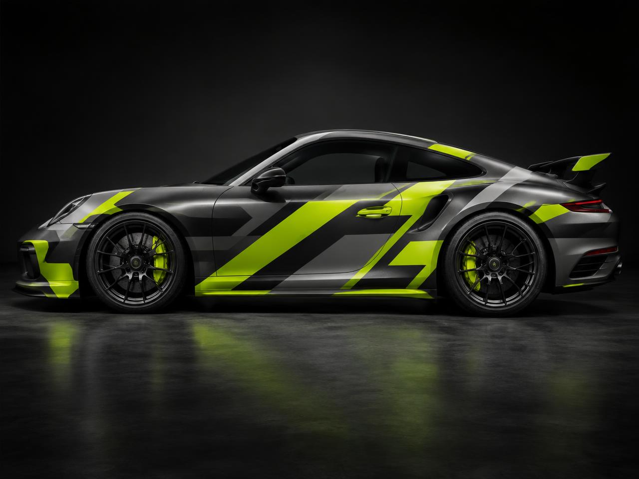 Sports car with custom graphite and lime geometric livery graphics